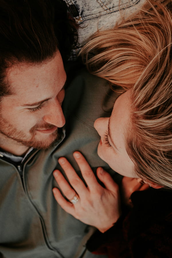 a woman and a man looking at each other